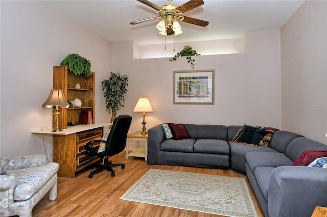 office space featuring ceiling fan and light wood-type flooring