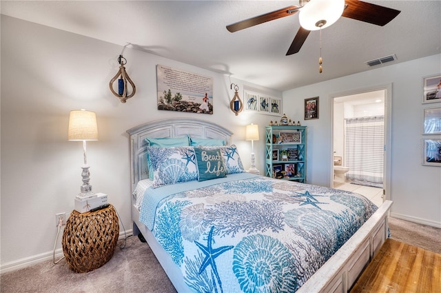 carpeted bedroom featuring ceiling fan and connected bathroom