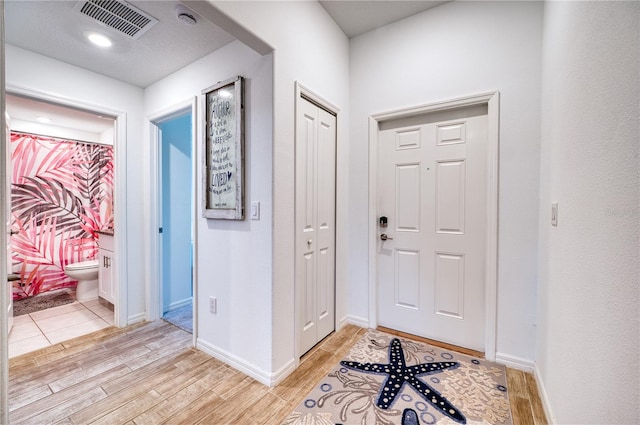 entrance foyer featuring light hardwood / wood-style flooring