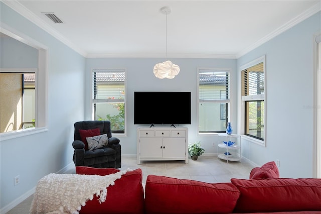 living room featuring ornamental molding, plenty of natural light, and light tile patterned floors