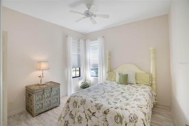 bedroom featuring ceiling fan and light hardwood / wood-style floors