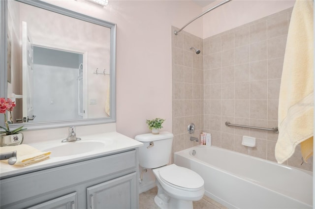 full bathroom featuring vanity, toilet, and tiled shower / bath combo