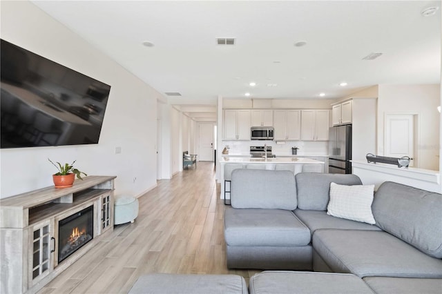 living room featuring light hardwood / wood-style floors