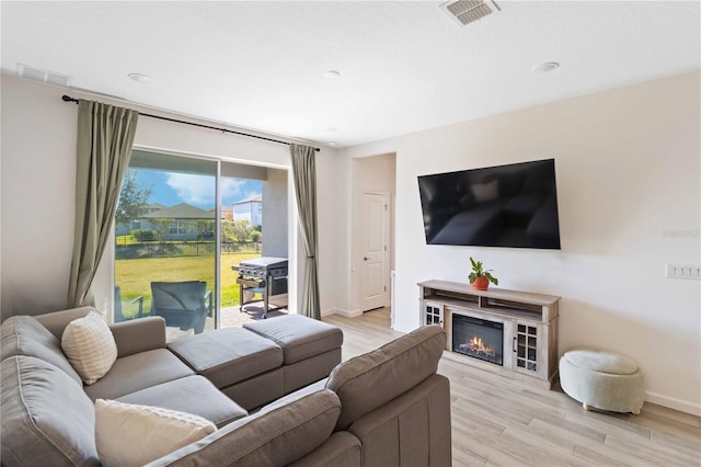 living room featuring light hardwood / wood-style floors