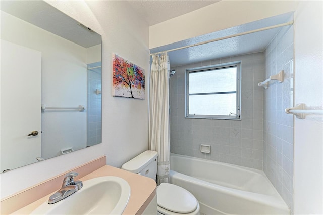 full bathroom featuring vanity, a textured ceiling, toilet, and shower / bath combo