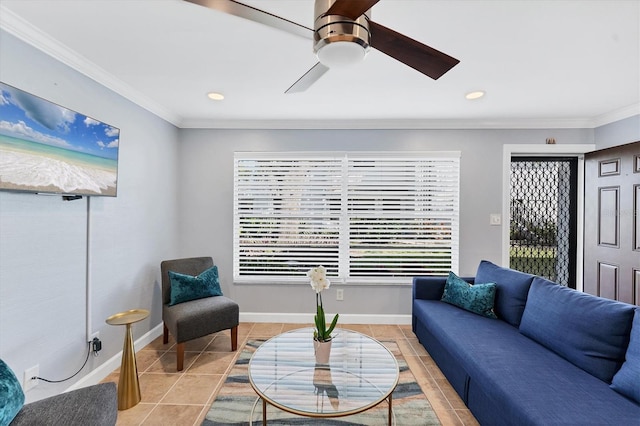 sitting room featuring light tile patterned flooring, ceiling fan, and ornamental molding