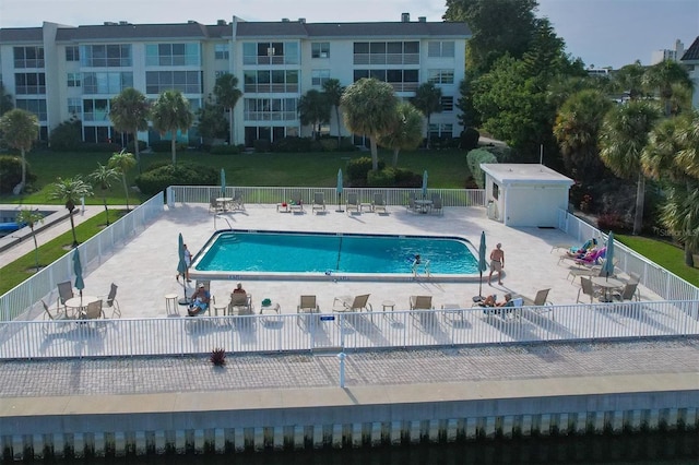 view of swimming pool featuring a patio area