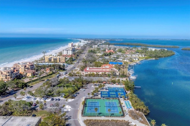 bird's eye view with a view of the beach and a water view