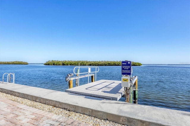 view of dock with a water view