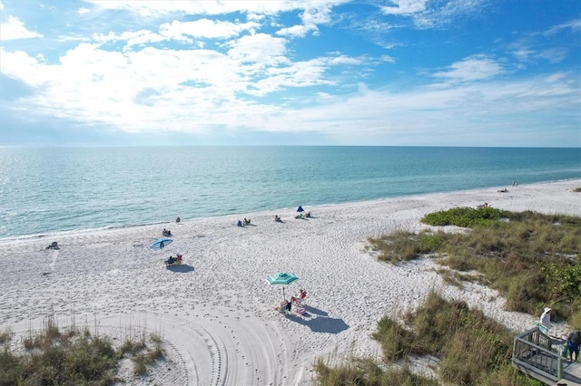 property view of water featuring a beach view