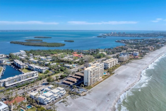 aerial view with a beach view and a water view