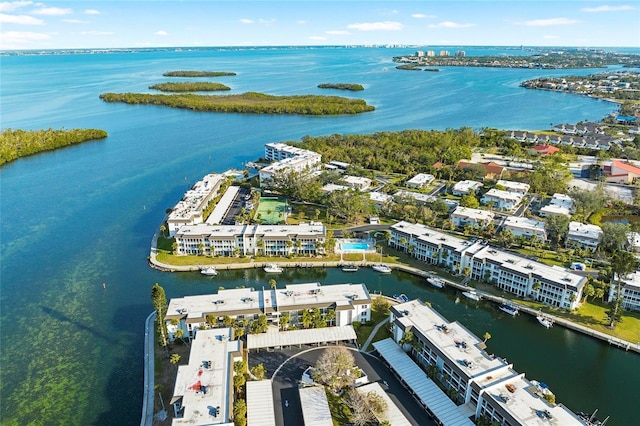 birds eye view of property featuring a water view