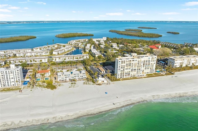 bird's eye view featuring a beach view and a water view