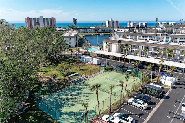 birds eye view of property with a water view