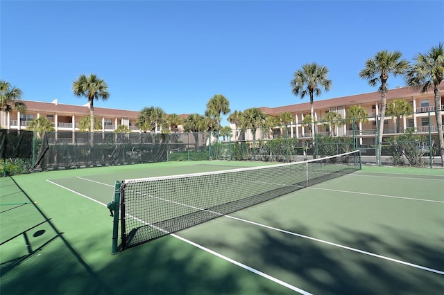 view of sport court featuring community basketball court and fence