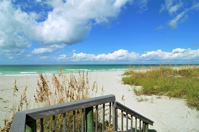 view of water feature with a beach view