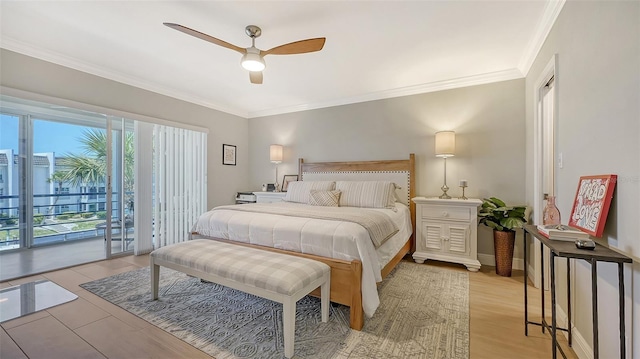 bedroom with a ceiling fan, ornamental molding, and access to exterior
