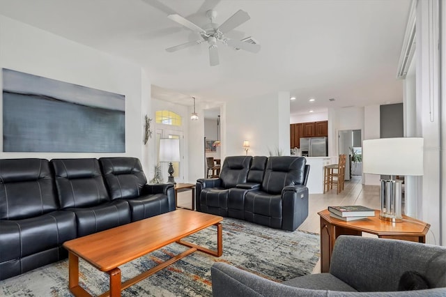 living room with ceiling fan