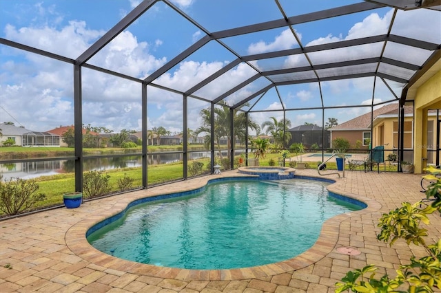 view of pool featuring a water view, an in ground hot tub, a lanai, and a patio area