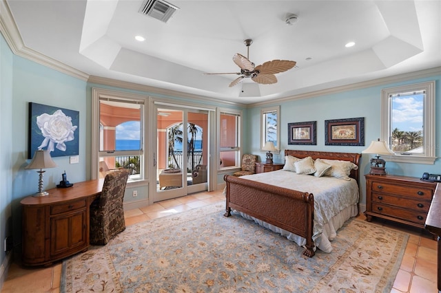 bedroom with crown molding, light tile patterned floors, a raised ceiling, visible vents, and access to outside