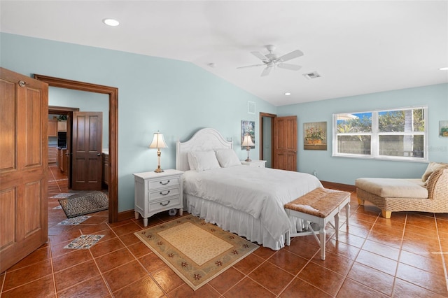 bedroom with tile patterned flooring, visible vents, lofted ceiling, and baseboards