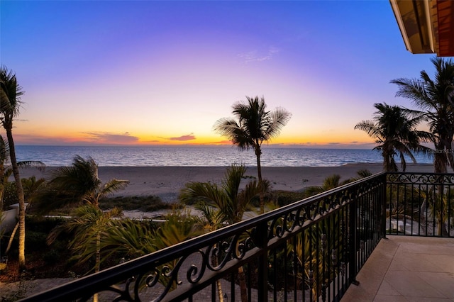 balcony at dusk with a water view