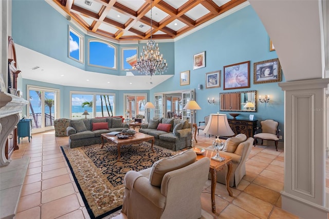 living room with light tile patterned floors, a fireplace, coffered ceiling, beamed ceiling, and an inviting chandelier