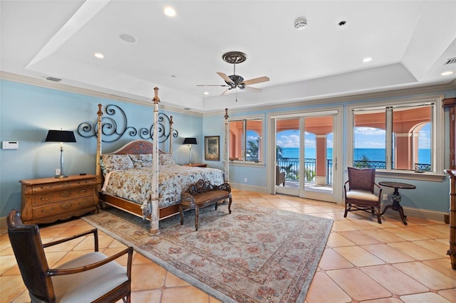 bedroom featuring access to outside, a raised ceiling, visible vents, and baseboards