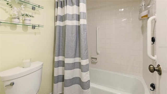 bathroom with shower / bath combination with curtain and toilet