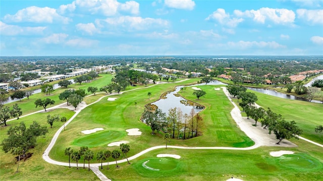 bird's eye view featuring a water view and golf course view