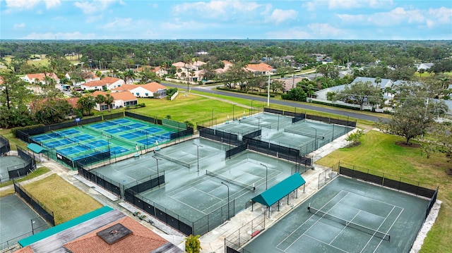 birds eye view of property with a residential view