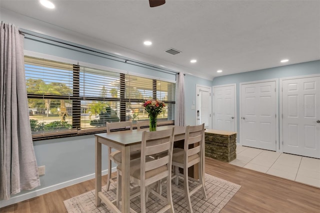 dining room featuring light hardwood / wood-style floors