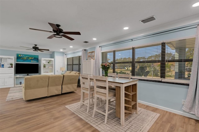 dining room featuring light hardwood / wood-style floors