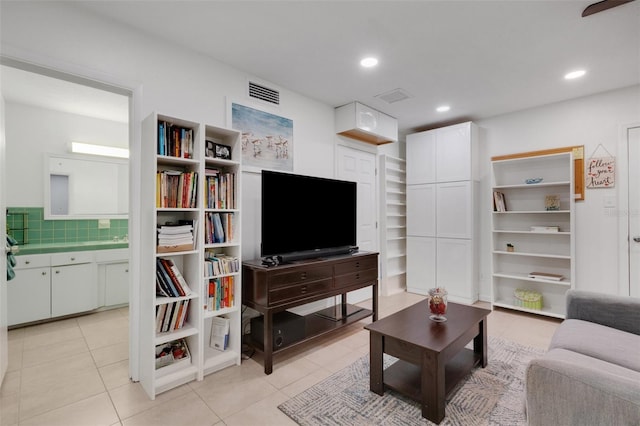 living room with light tile patterned flooring