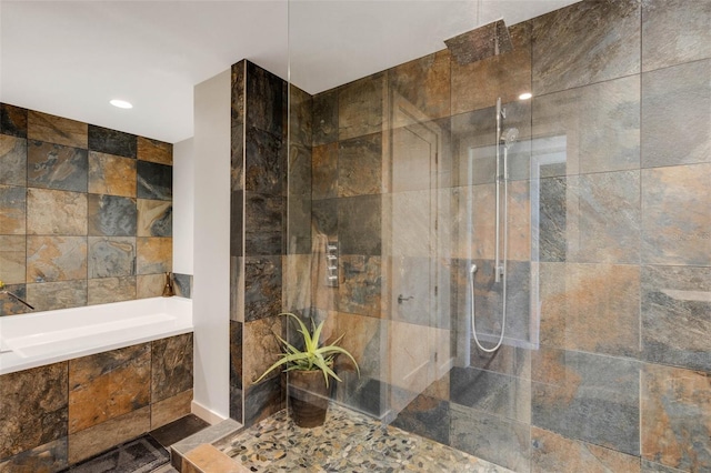 bathroom featuring plus walk in shower