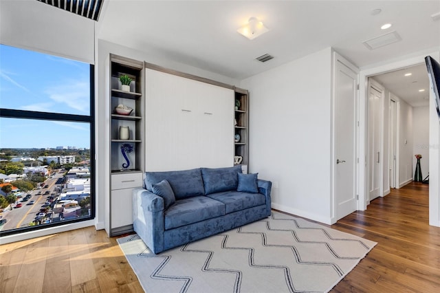 living room with hardwood / wood-style flooring