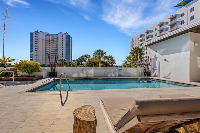 view of pool featuring a patio area