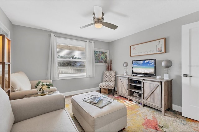 living room with ceiling fan