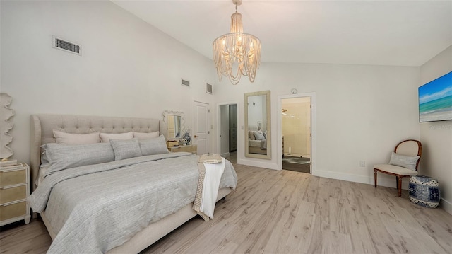 bedroom with an inviting chandelier, connected bathroom, high vaulted ceiling, and light wood-type flooring