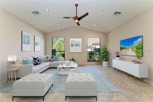 living room featuring vaulted ceiling, plenty of natural light, and ceiling fan