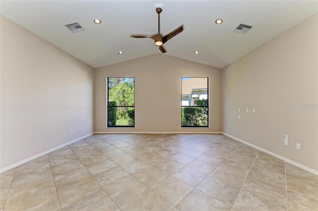 unfurnished room featuring light tile patterned flooring, lofted ceiling, and ceiling fan