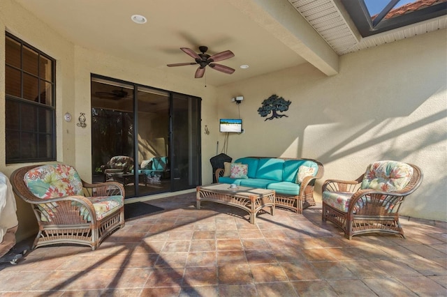 view of patio / terrace featuring an outdoor living space and ceiling fan