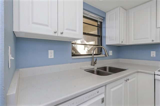 kitchen with sink and white cabinets