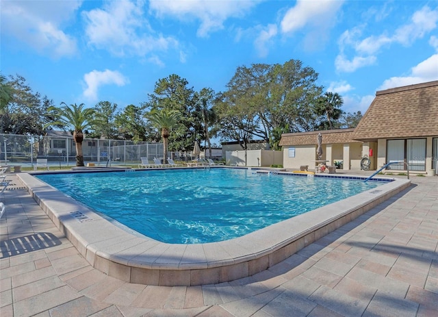 view of pool featuring a patio