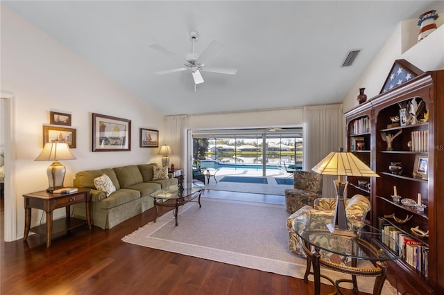 living room featuring high vaulted ceiling, dark hardwood / wood-style floors, and ceiling fan