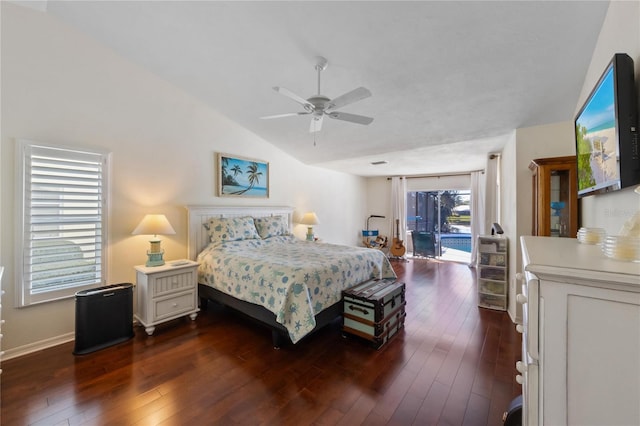 bedroom with ceiling fan, lofted ceiling, access to exterior, and dark hardwood / wood-style flooring