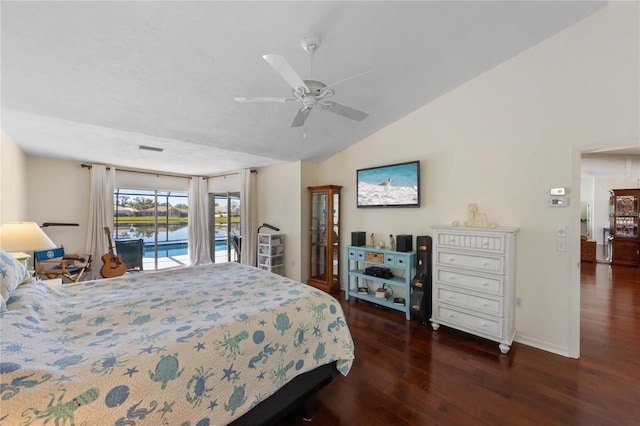 bedroom featuring vaulted ceiling, dark wood-type flooring, access to outside, and ceiling fan