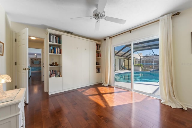 interior space featuring dark hardwood / wood-style floors and ceiling fan