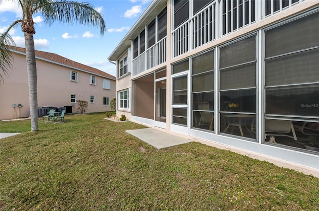 view of yard featuring central AC