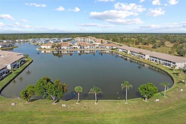 drone / aerial view with a water view